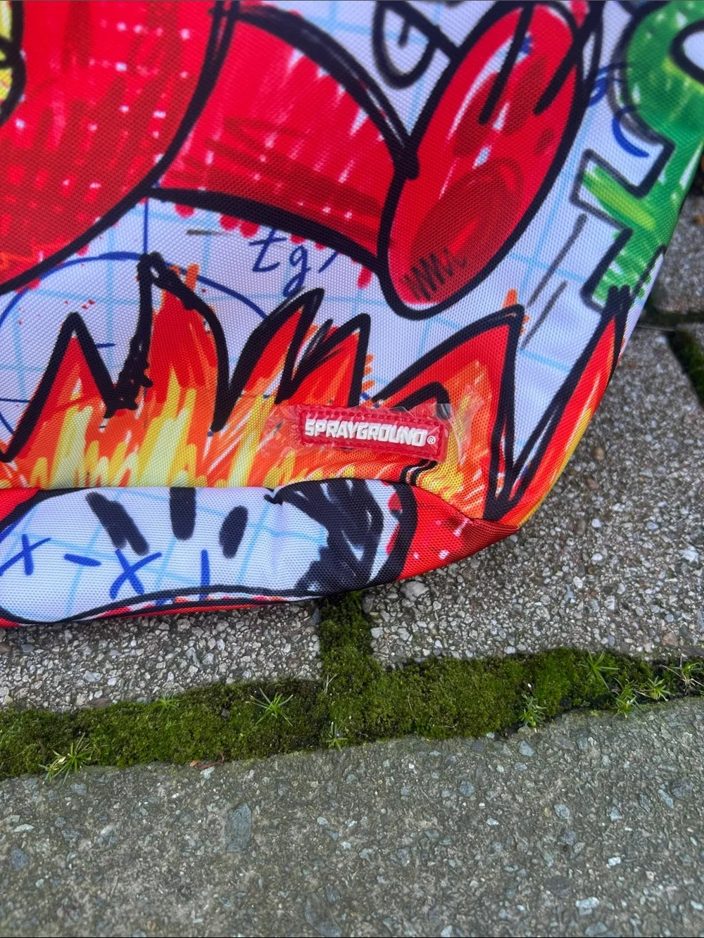 Sprayground Red, Yellow & Green Graffiti Backpack